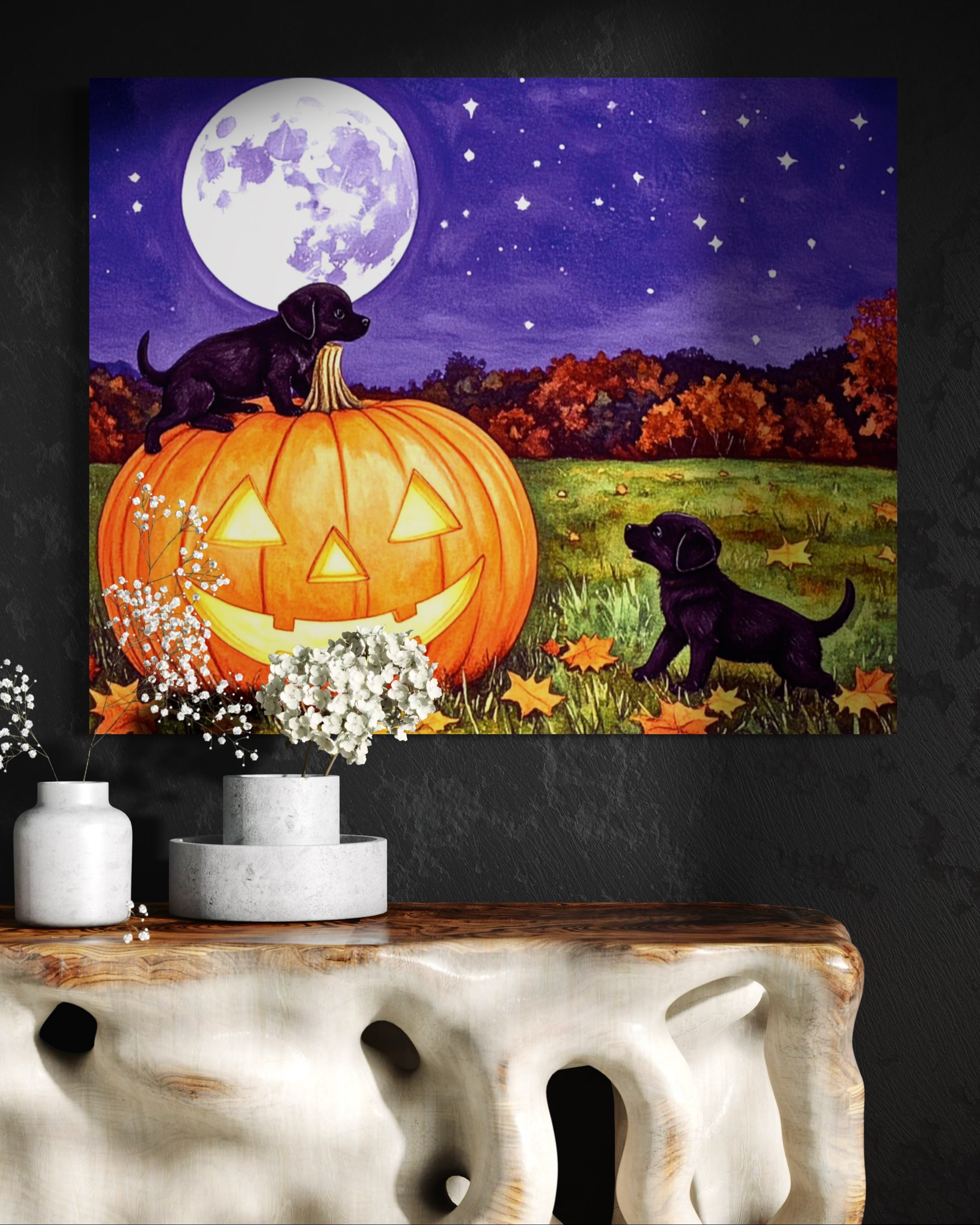 Puppies play on a Pumpkin