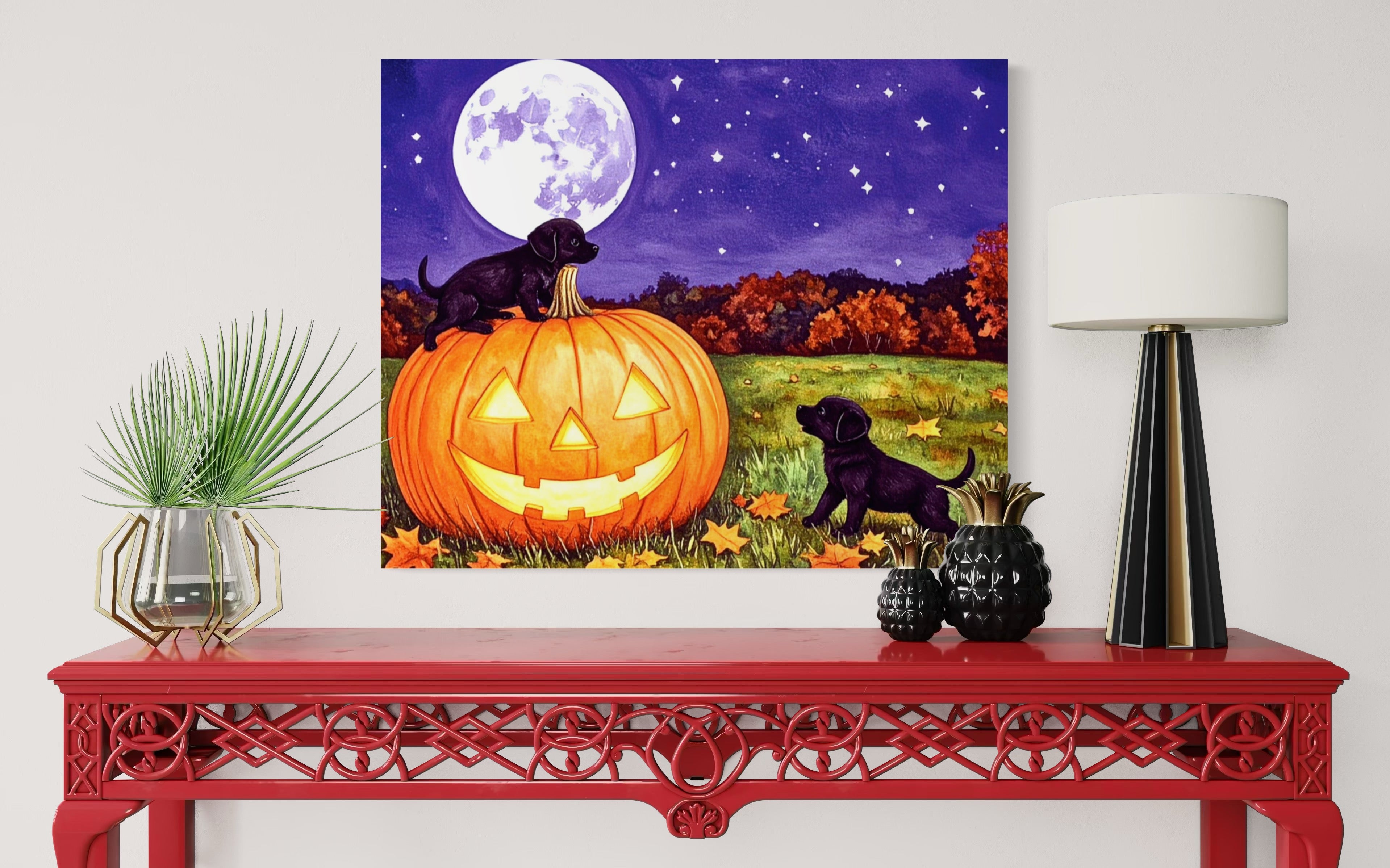 Puppies play on a Pumpkin