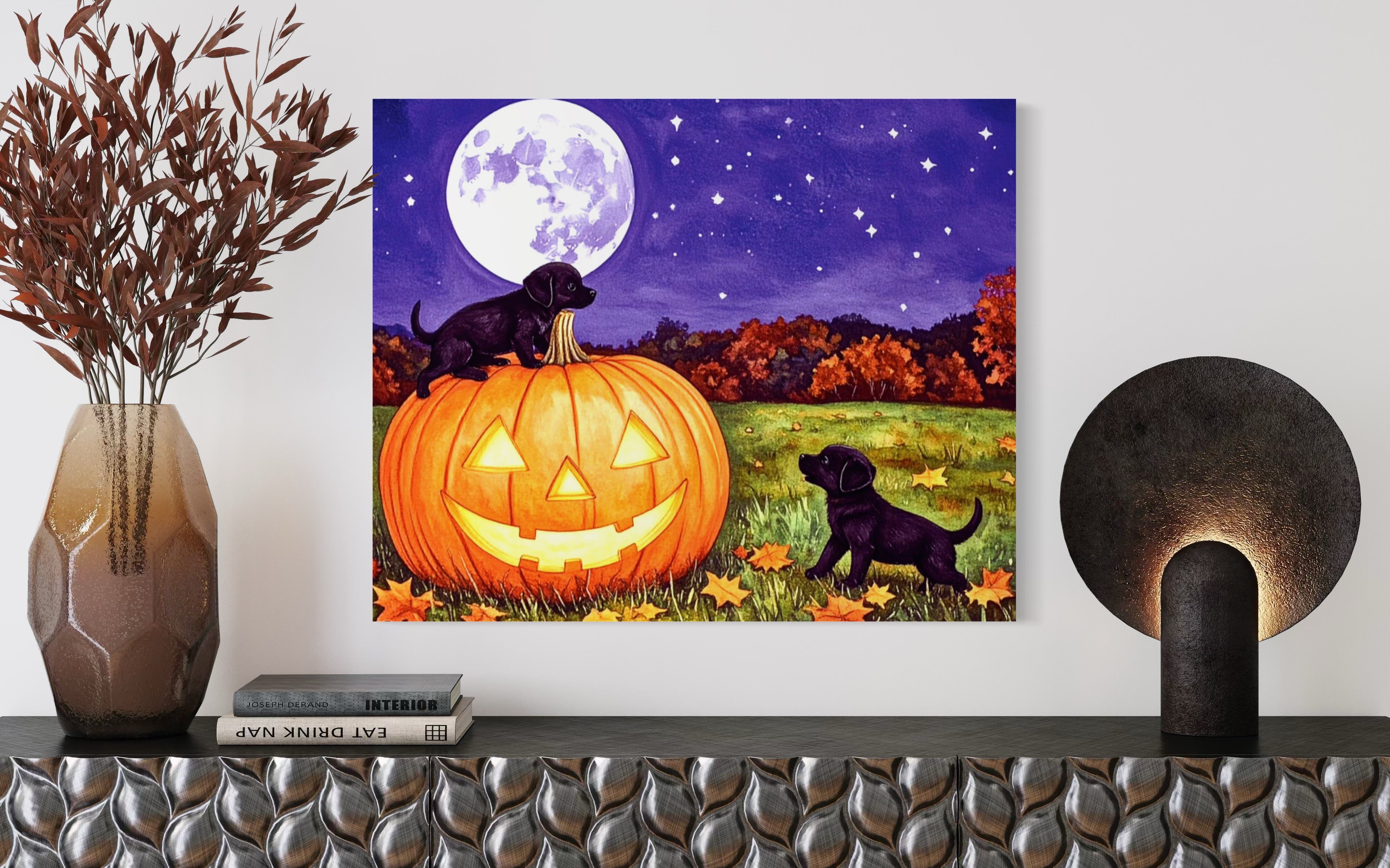 Puppies play on a Pumpkin