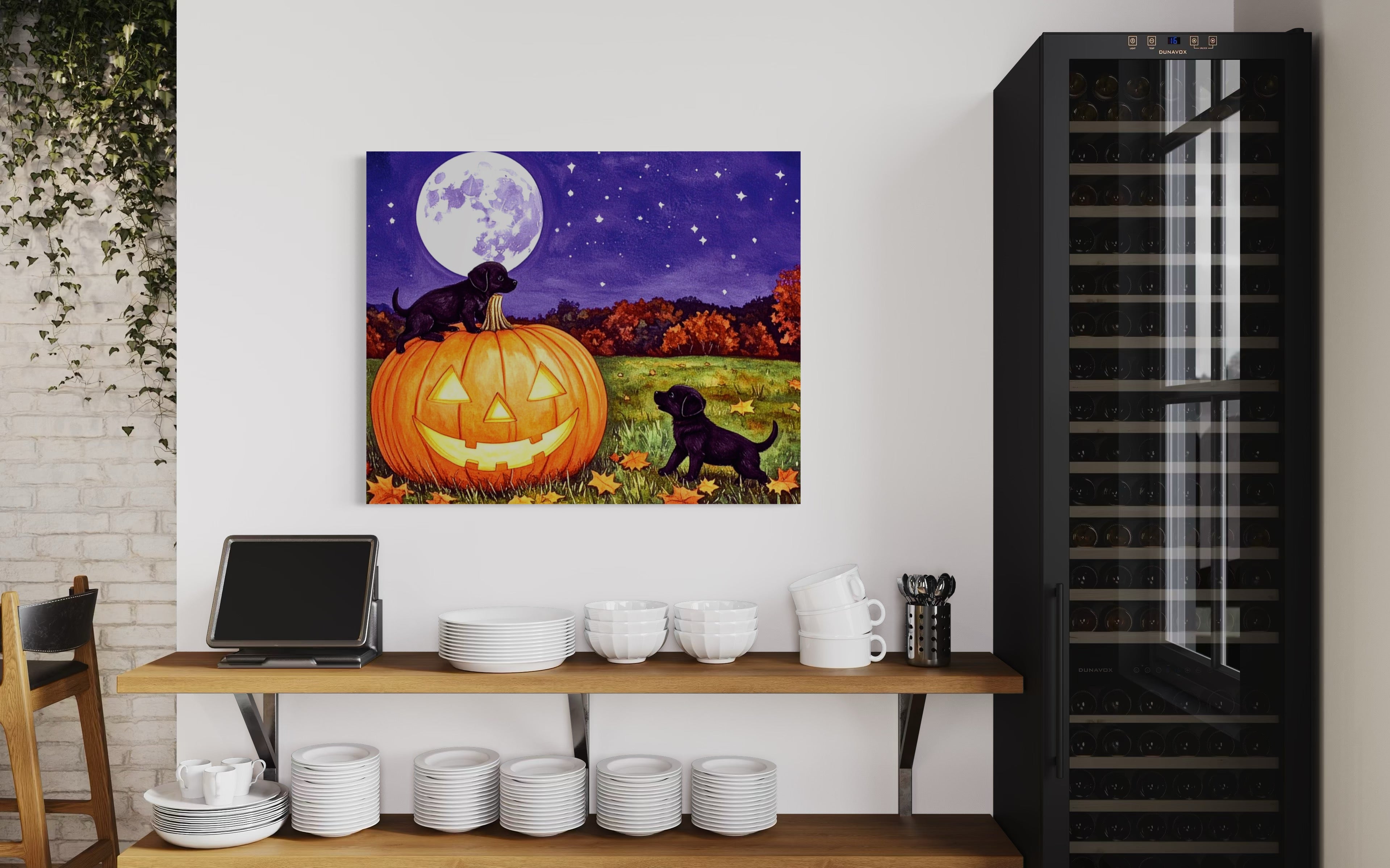Puppies play on a Pumpkin