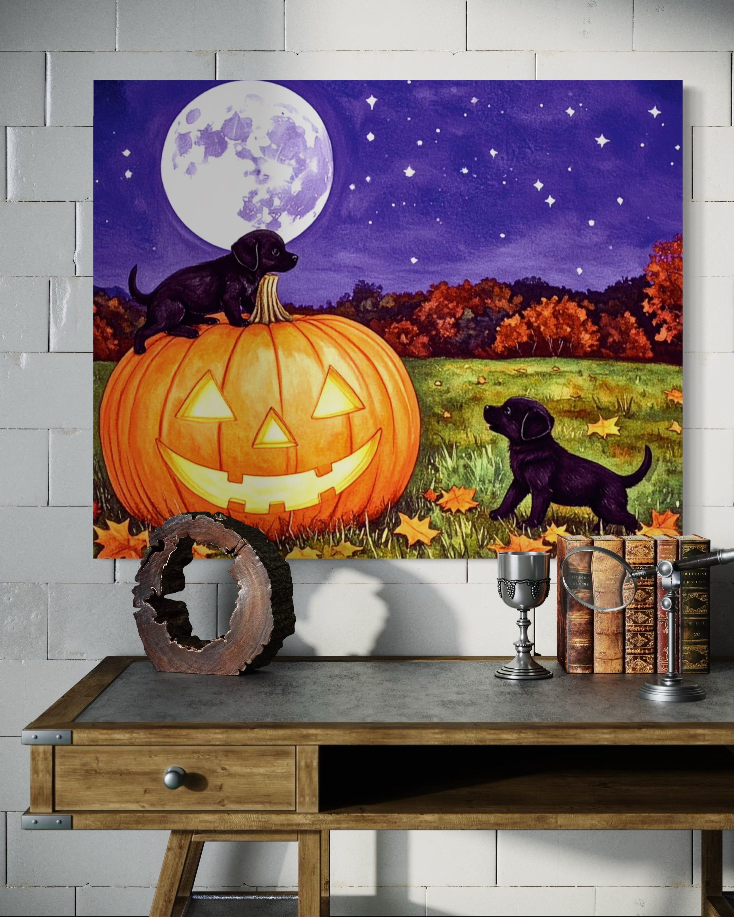 Puppies play on a Pumpkin