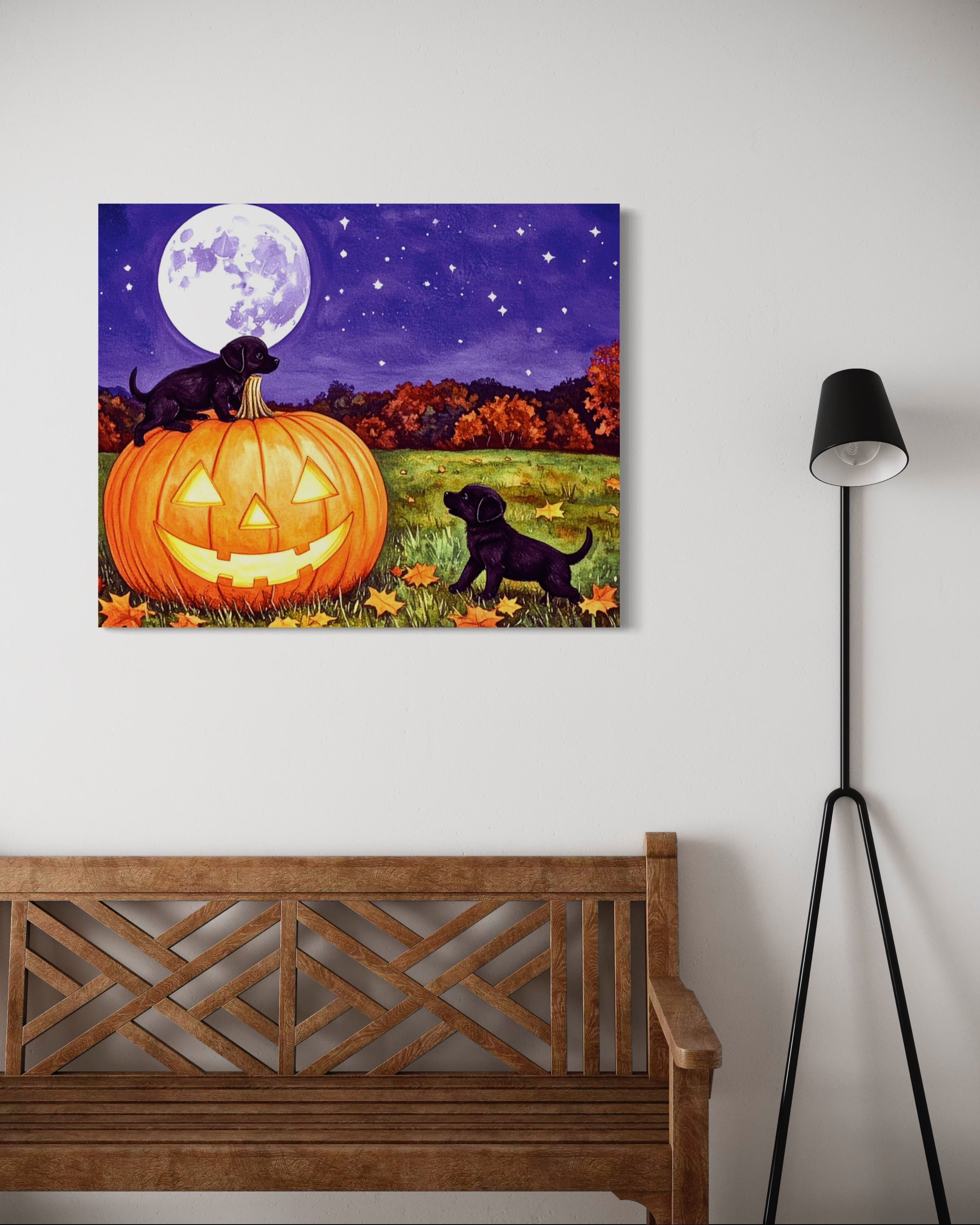 Puppies play on a Pumpkin